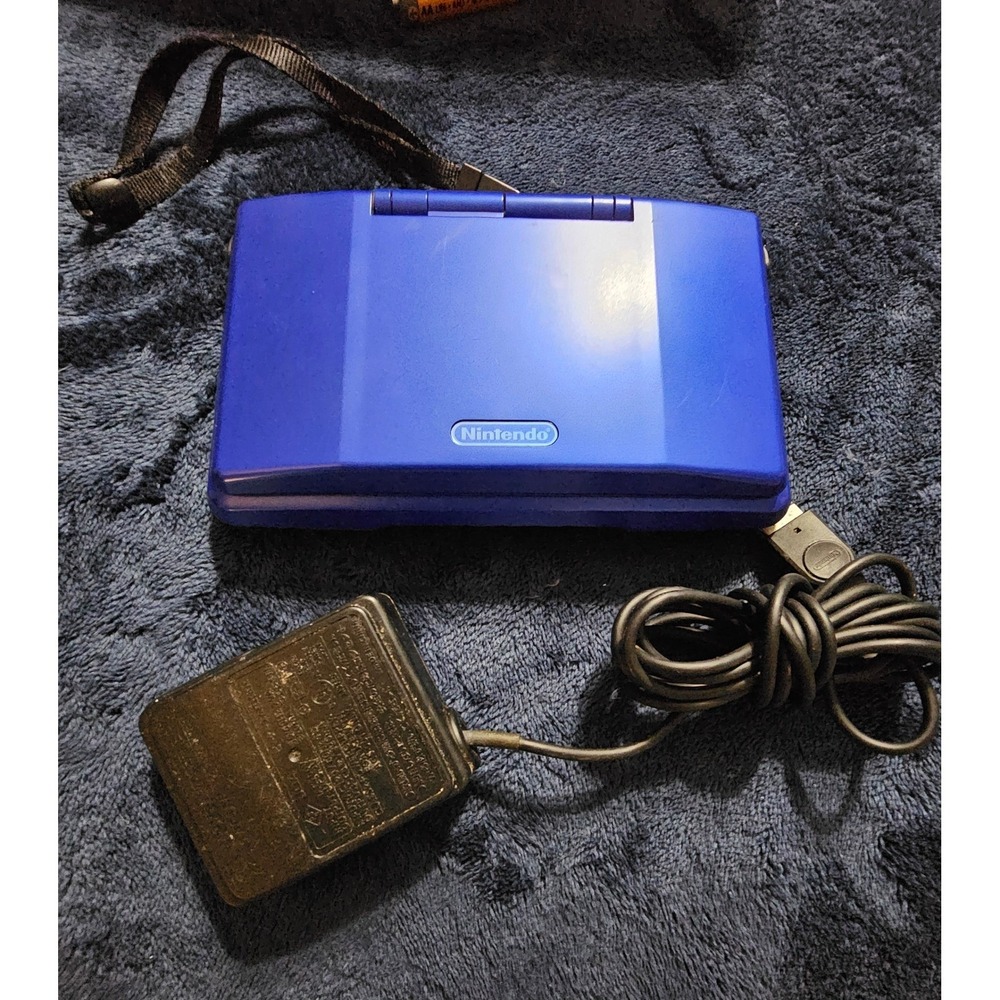 Nintendo DS blue with charger and pen read description  see pics y2k vintage